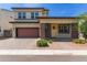 Charming two-story home featuring a welcoming front entrance and a neatly landscaped yard at 1857 W 22Nd Ave, Apache Junction, AZ 85120