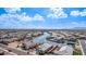 Aerial view of a lakefront community showcasing waterfront homes, serene water views and well-maintained surroundings at 22206 N Daniel Dr, Maricopa, AZ 85138