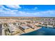 Aerial view of a well planned community with lakefront homes and mature landscaping, offering a serene environment at 22206 N Daniel Dr, Maricopa, AZ 85138