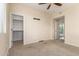 Spacious bedroom with a walk-in closet and access to another room, providing versatility at 2315 N 52Nd St # 144, Phoenix, AZ 85008