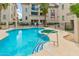 Community pool with a hot tub and a shallow end for relaxation and recreation at 2315 N 52Nd St # 144, Phoenix, AZ 85008
