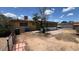 Spacious backyard with a brick patio, partial fencing, and views of the home at 2414 W Cholla St, Phoenix, AZ 85029