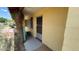 Cozy front entrance with decorative greenery, painted brick, and an awning at 2414 W Cholla St, Phoenix, AZ 85029