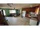 Open-concept living room and kitchen provides plenty of room to entertain at 2414 W Cholla St, Phoenix, AZ 85029