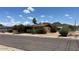 Street view of home with well-maintained landscaping and a charming desert aesthetic at 2414 W Cholla St, Phoenix, AZ 85029