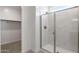 Modern bathroom featuring glass shower doors with marble finish at 25096 N 154Th Ln, Surprise, AZ 85387