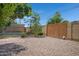 Backyard features desert landscaping with a private fence at 2510 W Columbine Dr, Phoenix, AZ 85029