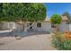 Well-maintained front yard features mature landscaping and a welcoming entrance at 2510 W Columbine Dr, Phoenix, AZ 85029