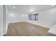 Open-concept living space with neutral paint, sleek flooring, and abundant natural light at 2510 W Columbine Dr, Phoenix, AZ 85029