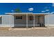 Exterior of home featuring a covered front patio and desert landscaping at 2650 W Union Hills Dr # 16, Phoenix, AZ 85027