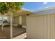 Exterior view of home with covered carport and privacy fence in a sunny setting at 2650 W Union Hills Dr # 16, Phoenix, AZ 85027