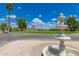 Scenic view of the golf course featuring lush green fairways and a decorative water fountain at 2650 W Union Hills Dr # 16, Phoenix, AZ 85027