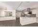 The bright, renovated kitchen features granite countertops and stainless-steel appliances for modern cooking at 2650 W Union Hills Dr # 16, Phoenix, AZ 85027