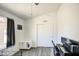 Bedroom featuring a ceiling fan, closet, desk, and a sunny window view at 2845 E Irwin Ave, Mesa, AZ 85204