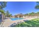 Inviting community pool with pristine blue water and well-maintained surroundings at 2845 E Irwin Ave, Mesa, AZ 85204