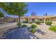 Charming single-story home with a well-manicured, low maintenance front yard and private two car garage at 2845 E Irwin Ave, Mesa, AZ 85204