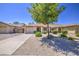Charming single-story home with a well-manicured, low maintenance front yard and private two car garage at 2845 E Irwin Ave, Mesa, AZ 85204