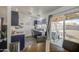 Bright kitchen with backyard view and an island, boasting dark cabinets and white countertops at 2845 E Irwin Ave, Mesa, AZ 85204