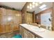 Bathroom featuring a double sink vanity with storage at 3301 S Goldfield Rd # 1010, Apache Junction, AZ 85119