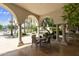 Enjoy the outdoors with this covered patio and beautiful columns with views of pool and palms at 3301 S Goldfield Rd # 1010, Apache Junction, AZ 85119