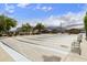 Community shuffleboard with mountain views and plenty of seating to enjoy a game at 3301 S Goldfield Rd # 1010, Apache Junction, AZ 85119