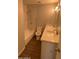 Bathroom featuring a bath tub, tiled shower and dual vanity sinks with modern fixtures and great lighting at 4049 N 81St Ave, Phoenix, AZ 85033