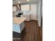 Bright kitchen featuring white cabinetry, stainless steel appliances, and a large island with countertops at 4049 N 81St Ave, Phoenix, AZ 85033