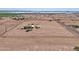 Aerial shot emphasizing the spacious lot and the home within its rural context at 43384 W Padilla Rd, Maricopa, AZ 85138