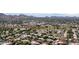 Panoramic view of a neighborhood with homes, trees, mountains and golf course at 5438 E Lupine Ave, Scottsdale, AZ 85254