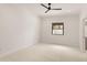 Minimalist bedroom with natural light and a view to the backyard at 5438 E Lupine Ave, Scottsdale, AZ 85254