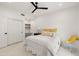 Cozy bedroom with a comfortable bed, built-in desk, and bright, natural lighting at 5438 E Lupine Ave, Scottsdale, AZ 85254