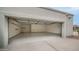 Clean, spacious garage with ample storage space and epoxy flooring at 5438 E Lupine Ave, Scottsdale, AZ 85254