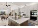 Open kitchen features a large center island, stainless steel appliances, and plenty of counter space at 5438 E Lupine Ave, Scottsdale, AZ 85254
