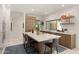 Spacious kitchen with a large center island and seating, stainless steel appliances, and modern finishes at 5438 E Lupine Ave, Scottsdale, AZ 85254