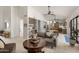 Bright living area with open layout connecting to the kitchen, featuring stylish decor and ample natural light at 5438 E Lupine Ave, Scottsdale, AZ 85254