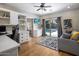 Versatile home office with custom built-ins and a view of the inviting backyard pool area at 5926 E Hartford Ave, Scottsdale, AZ 85254