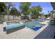 Stunning pool and spa with mature landscaping, perfect for relaxation and outdoor entertainment at 5926 E Hartford Ave, Scottsdale, AZ 85254