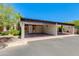 A well-maintained carport with ample parking space and privacy screen, offering convenient covered parking at 6 E Manzanita Dr, Phoenix, AZ 85020