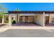 Attached carport featuring a brown beam and tile roof providing covered parking at 6 E Manzanita Dr, Phoenix, AZ 85020