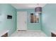 Bright entry room featuring marble floors, a white door, and a window with a view to the outdoors at 6 E Manzanita Dr, Phoenix, AZ 85020