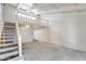 Bright and spacious living room with high ceilings and staircase to loft at 6 E Manzanita Dr, Phoenix, AZ 85020