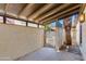 Enclosed patio with brick pavers and a metal gate leading to the exterior at 6 E Manzanita Dr, Phoenix, AZ 85020