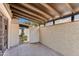 Enclosed patio with brick pavers, and a doorway to the exterior at 6 E Manzanita Dr, Phoenix, AZ 85020