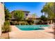 Sparkling community pool surrounded by lush landscaping and lounge chairs, perfect for relaxation and enjoyment at 6 E Manzanita Dr, Phoenix, AZ 85020