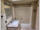 Bathroom features granite countertop vanity and shower with neutral tile surround at 603 S Allred Dr, Tempe, AZ 85281
