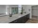 Bathroom featuring white countertop and dark wood cabinets with double sinks and mirrors at 6434 N 17Th St, Phoenix, AZ 85016