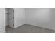 Neutral bedroom featuring carpeted floors and a closet perfect for storage at 6434 N 17Th St, Phoenix, AZ 85016