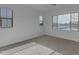 Spacious bedroom with multiple windows offering plenty of natural light at 6434 N 17Th St, Phoenix, AZ 85016