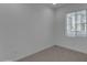 Neutral bedroom offers a clean, bright space with plush carpeting and ample natural light at 6434 N 17Th St, Phoenix, AZ 85016