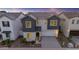 Attractive two-story home showcasing grey accents, low maintenance landscaping and a convenient two-car garage at 6434 N 17Th St, Phoenix, AZ 85016